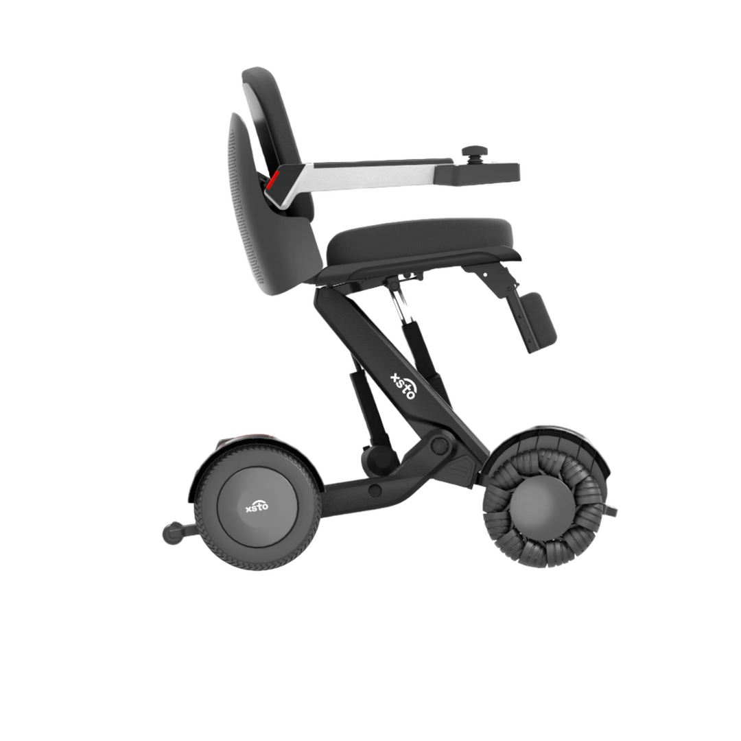 M4 Electric Wheelchair - by XSTO side view showing wheels frame arm rest down full height