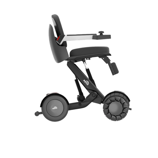 M4 Electric Wheelchair - by XSTO side view showing wheels frame arm rest down full height